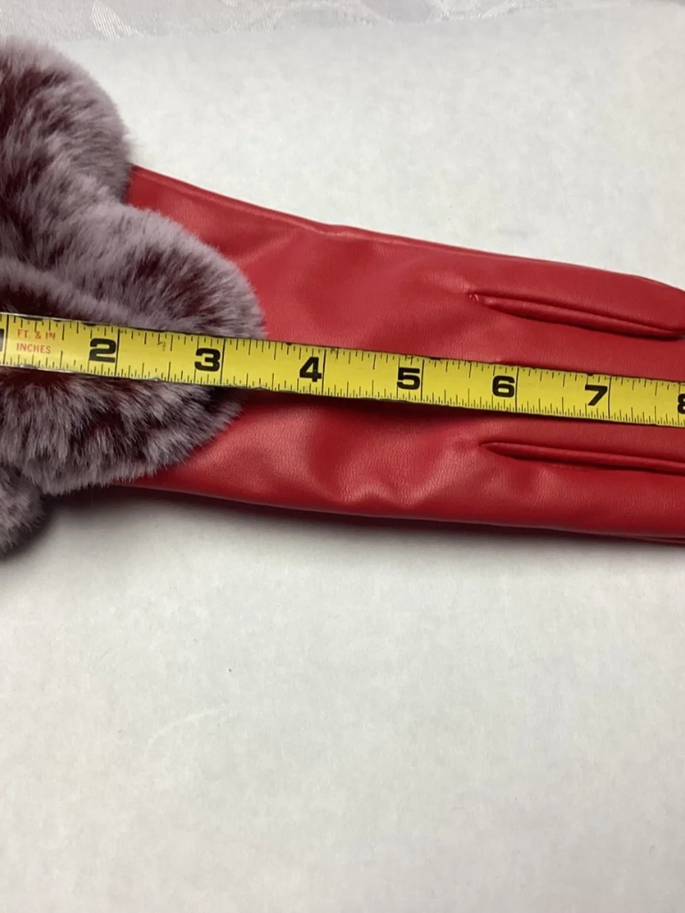 Red winter gloves with PURPLE FAUX FUR. really cute. Non leather